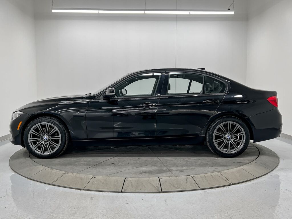 BMW 3 Series 330i xdrive 4-door suv black